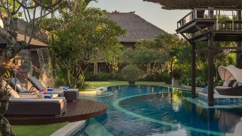 Villa terrace and pool at dusk in Bali